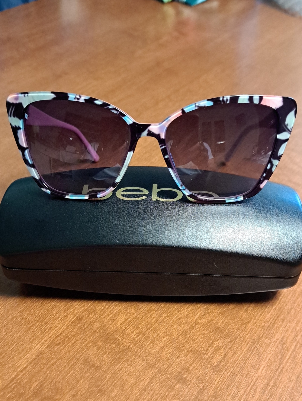 bebe Cat-Eye Sunglasses in Pink and Black Floral Print